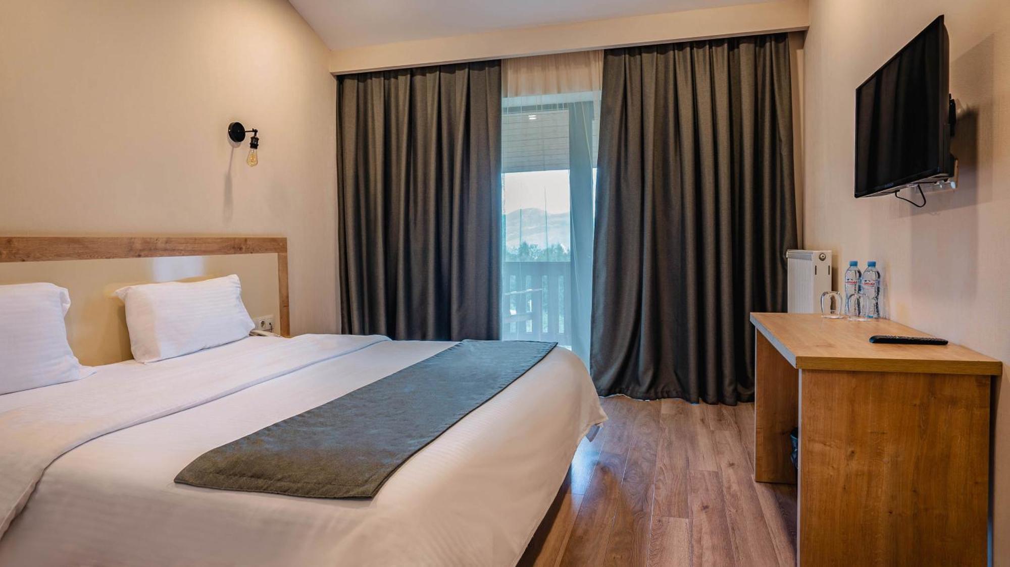 Gudauri Inn Rom bilde A room at the hotel