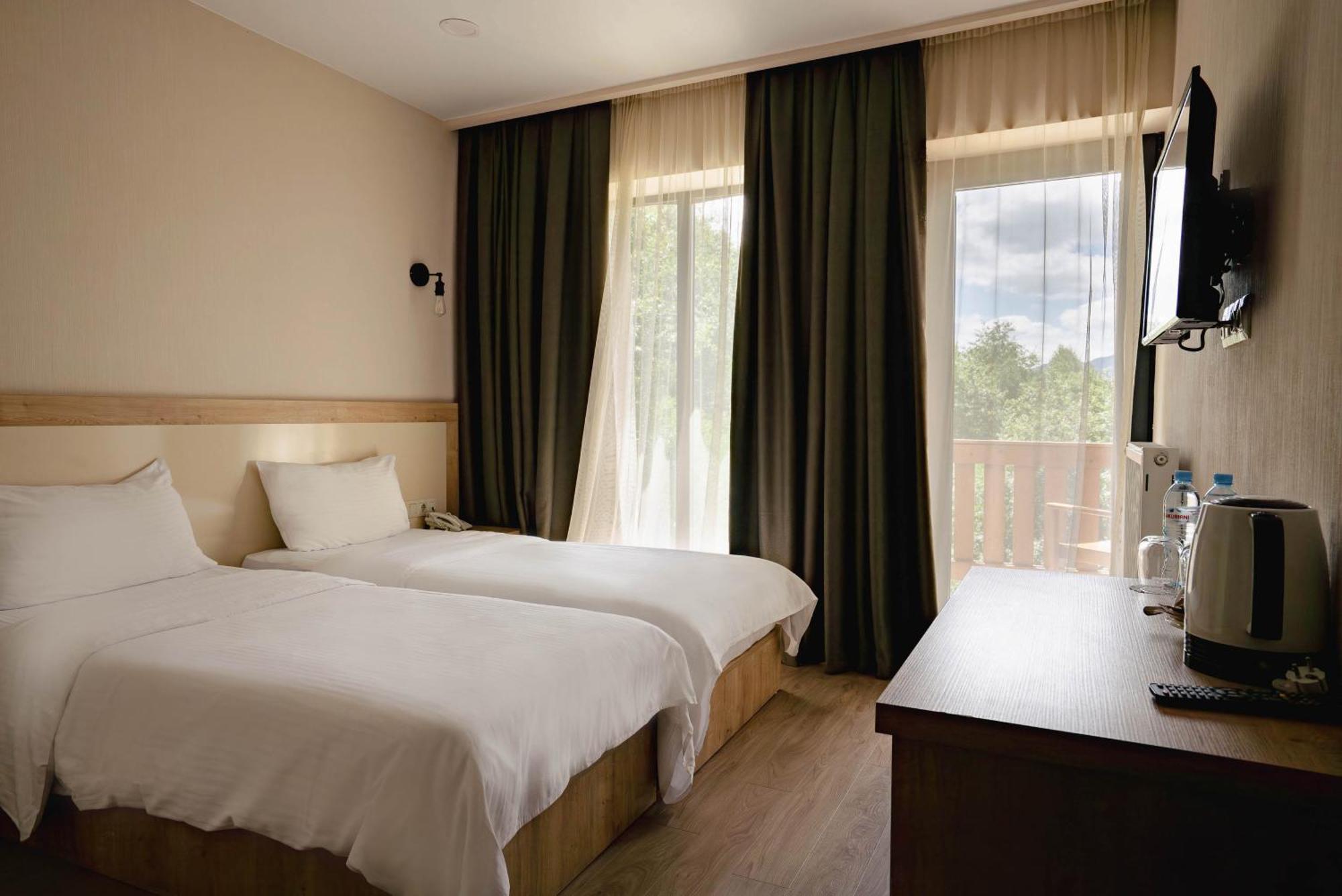 Gudauri Inn Rom bilde A room at the hotel
