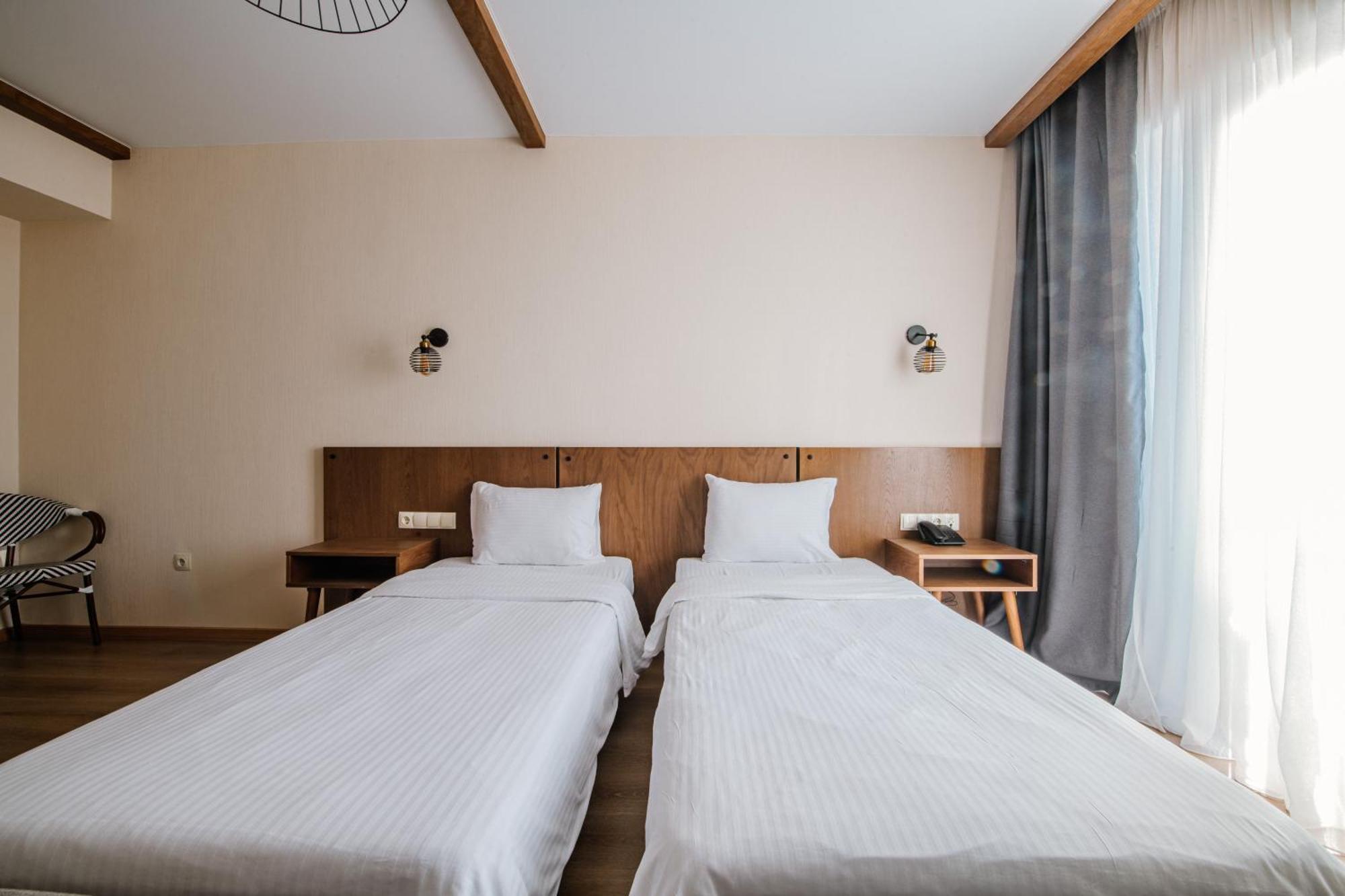 Gudauri Inn Rom bilde A room at the hotel